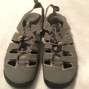 Keen closed toe, water proof, adventure shoe.